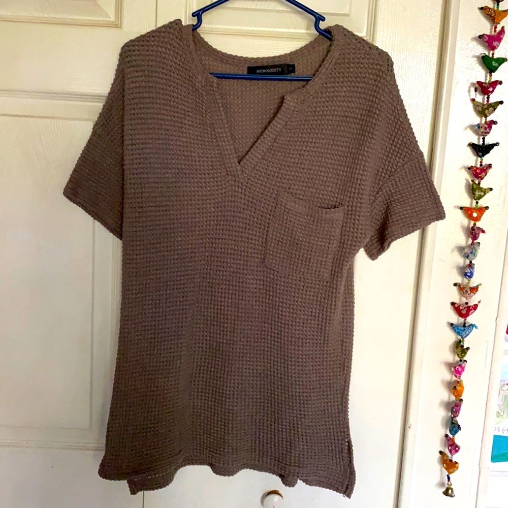 Olive green waffle texture shirt.